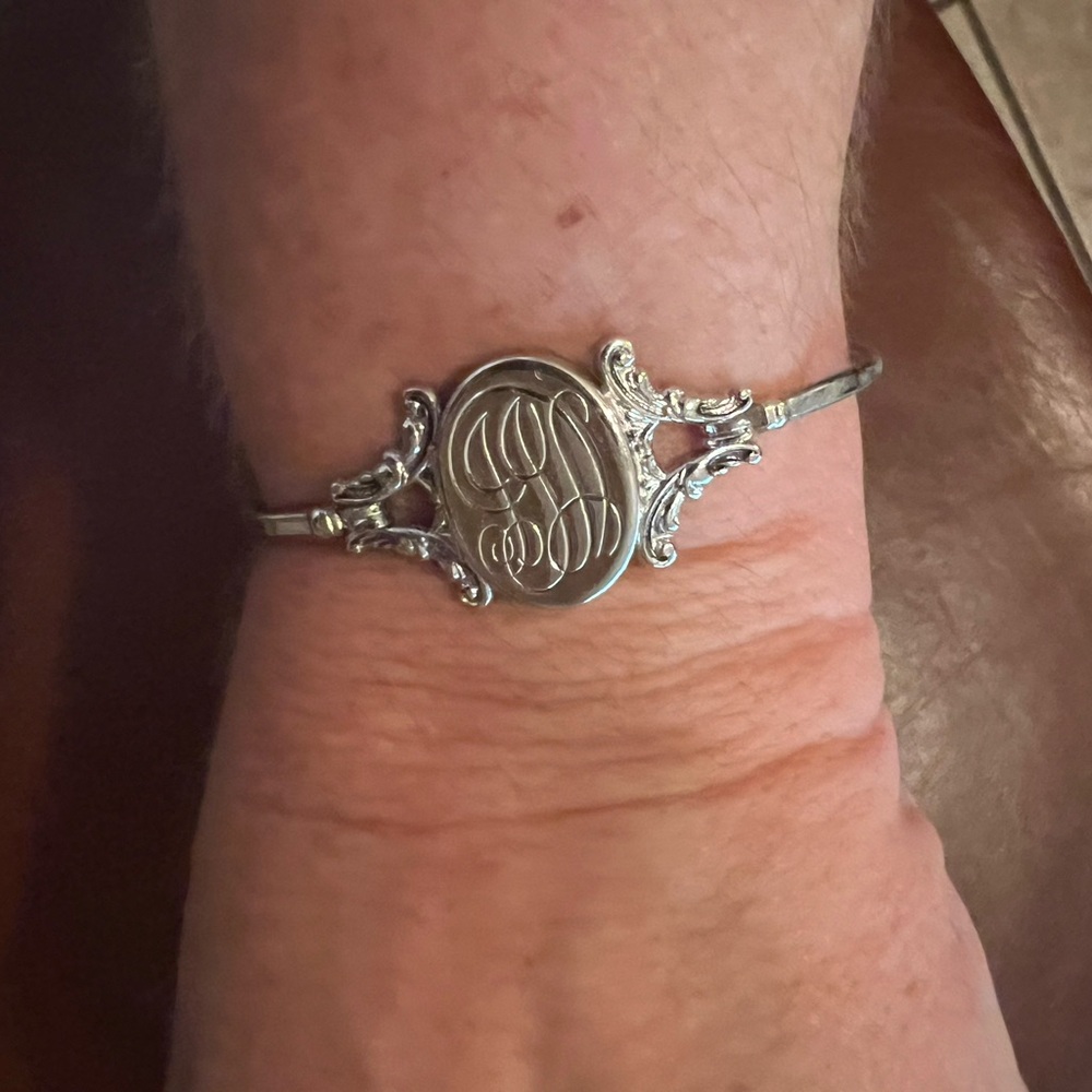 Monogramed locket bracelet bangle style. Initials JJL.
